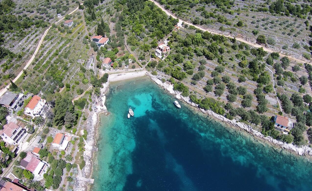 Aerial view of Mikulina Luka bay with Villa Belveder on the waterfront, Korčula, Croatia